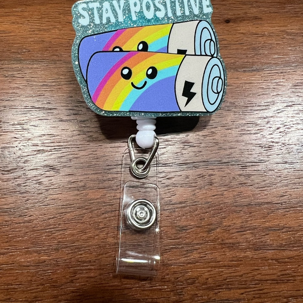 Stay Positive Badge Reel with Rainbow Design